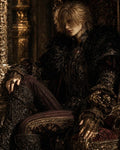 GRID THUMBNAIL — Androgynous royal figure in ornate dark brocade and jewellery reclines on a gilded throne, candlelit castle interior with rich gold detailing and fur mantle.